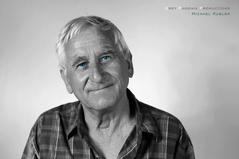 Picture of an old man in Black and White, except for Blue eyes